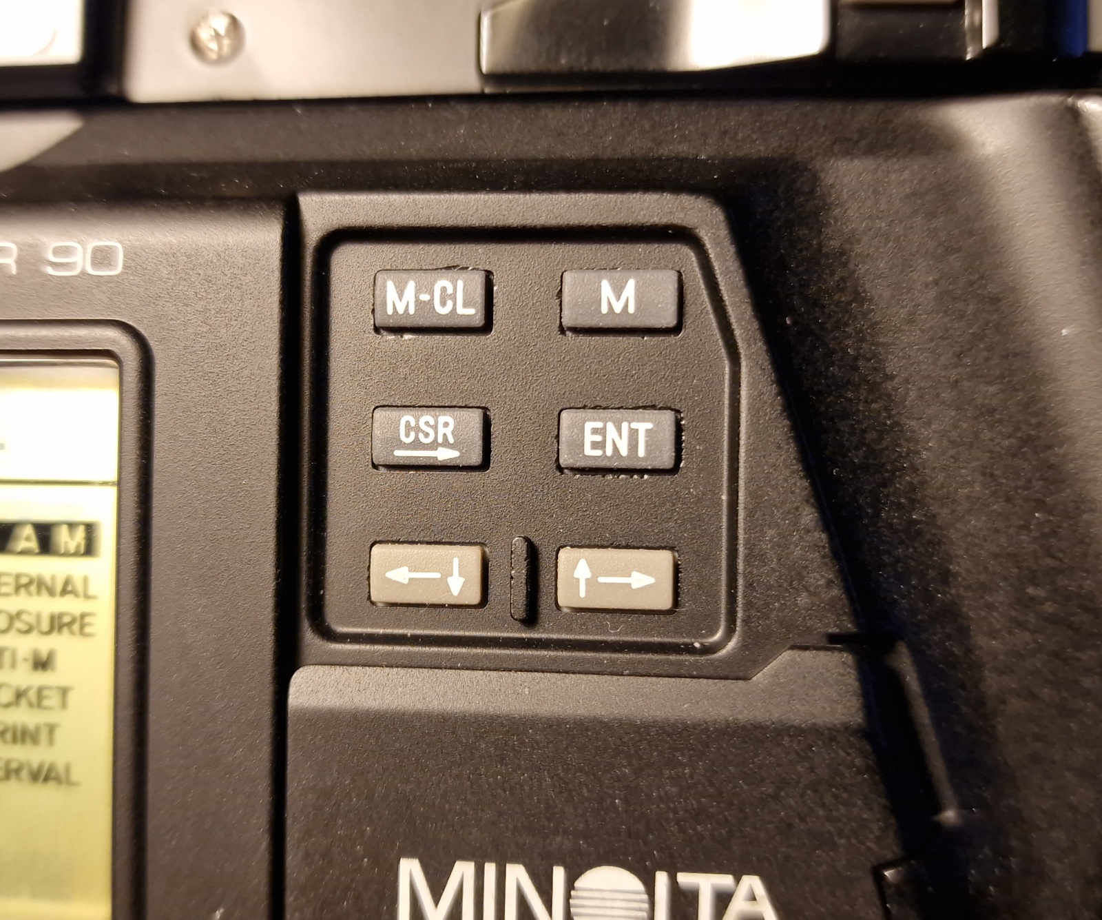 close-up of the data back's buttons with chipped edges on the shell around the buttons. or maybe it's the mould not fully filling rather than chipping