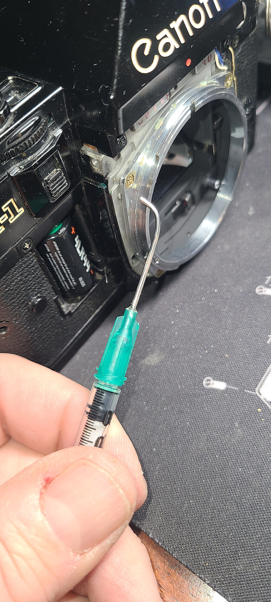 Bent needle oil injector.jpg