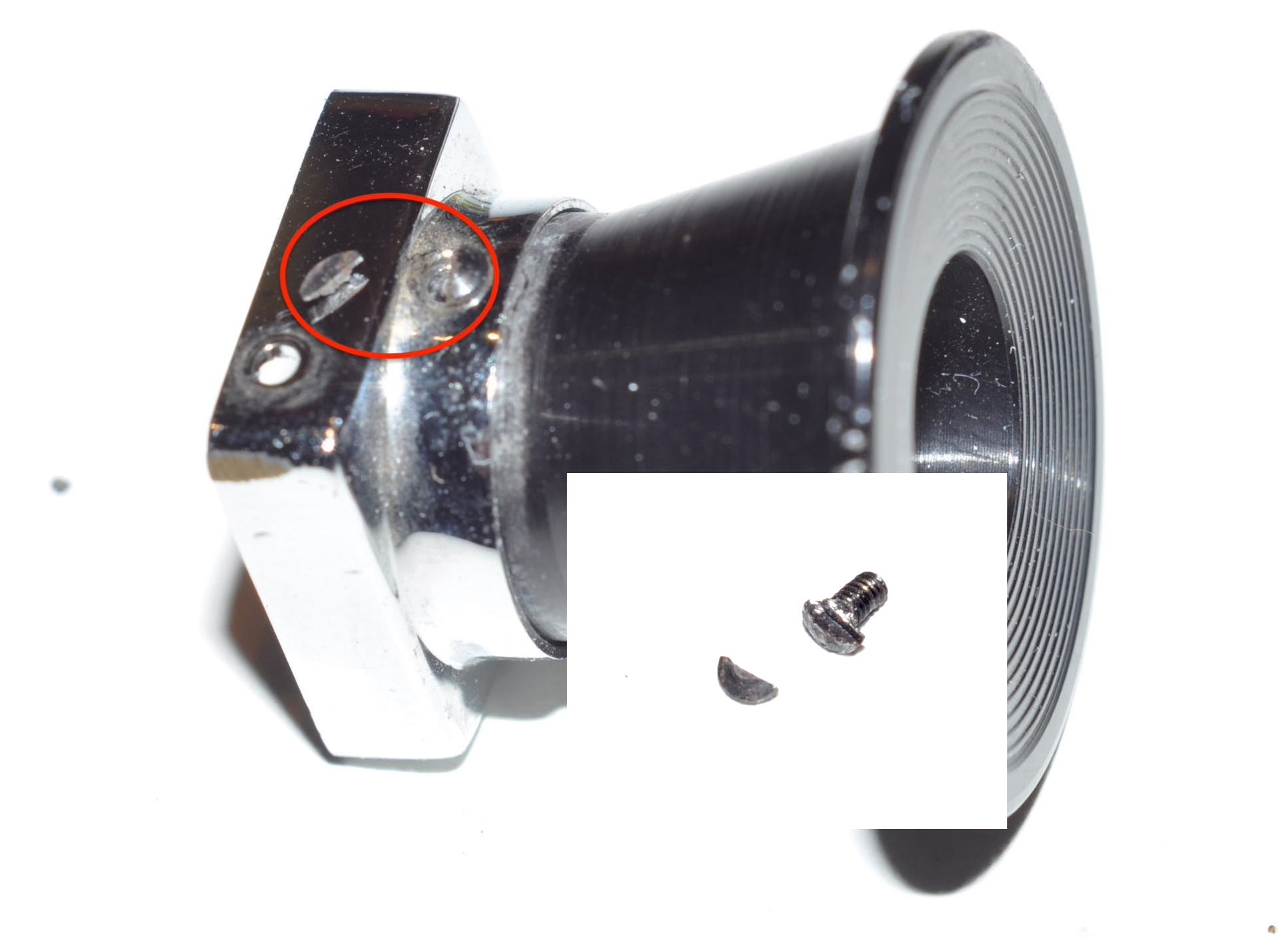 Bolex H16 eyepiece broken screw head.JPG
