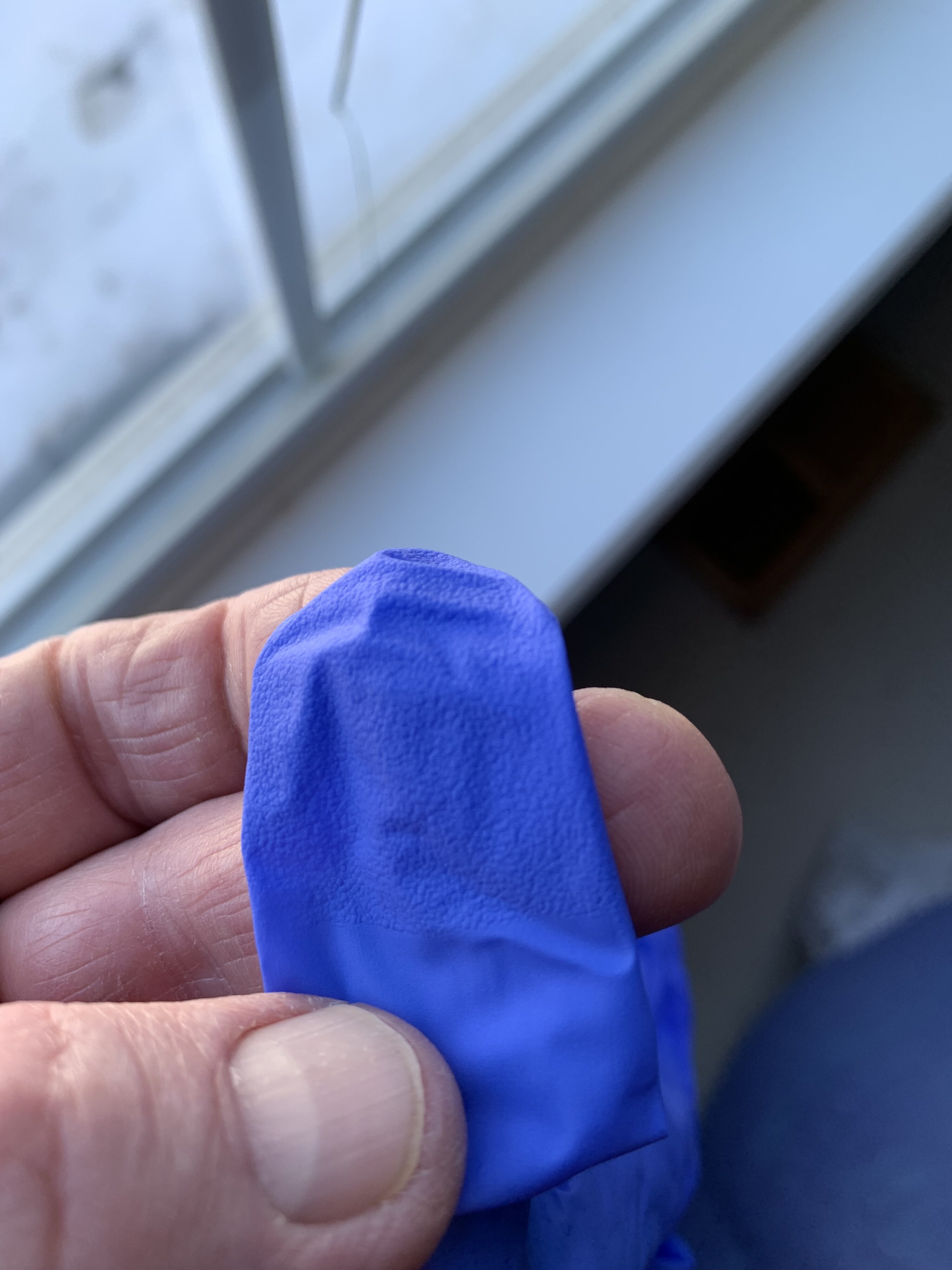 Check out the textured fingertips on my nitril glove. 