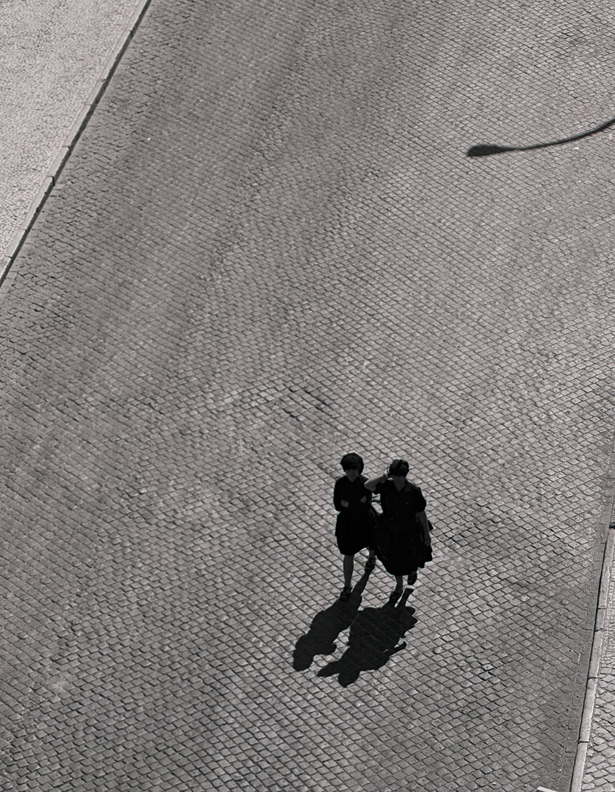 women-cobblestone-street.jpg