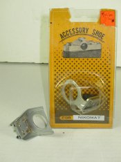 Nikkormat.Accessory.Shoe.Lot.02[pkg.front+OE.shoe]-S9o_2376.JPG