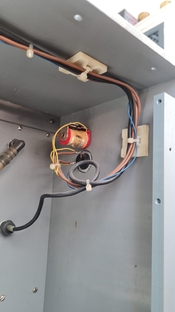 behind small side plug.jpeg