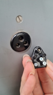 small plug on outside of machine.jpeg