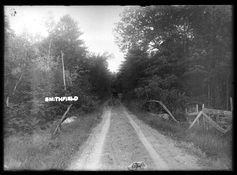 Car-Driving-Down-a-Dirt-Road In Smithfield.jpg