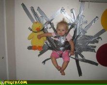 duct_tape_kid_to_wall.jpg