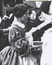 woman_with_uplifted_hand.JPG
