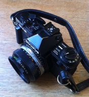 40mm Zuiko with step-up ring 49-52.jpg