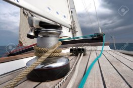 8306272-Winch-with-rope-on-sailing-boat-in-the-sea-Stock-Photo-yacht-luxury-deck.jpg