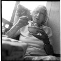 Grandma eating Strawberries with cream on her balcony