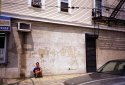 man against wall