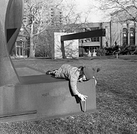 Margot relaxing on a sculpture