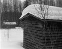 two sheds and snow