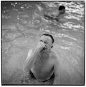 In a cheap Cape Cod Motel Pool