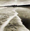 Dunstanborough Castle And Wave