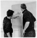Discussing the design of the sign