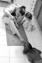 Trimming the dog's nails becomes a family affair