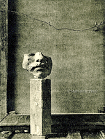 face on pedestal