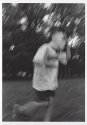 James,with a mask,running.