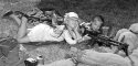 Two Girls and a Machine Gun