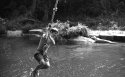 Swinging at the swimming hole