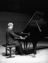 at the piano