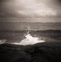 rocks waves clouds