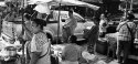 Monk In The Morning Market; Bangkok Thailand