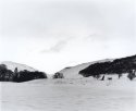 Snow on rolling hill