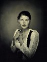 A wet-plate studio portrait of Maya.
