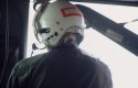 Hanging out the side of a Huey