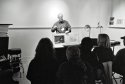 Evan- Tim Rudman talking to group in gallery