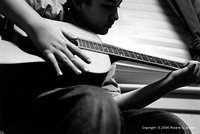 A boy with a guitar