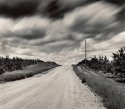 Dirt Road And Clouds