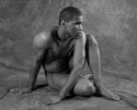 Tommy, seated