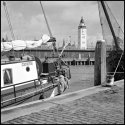 Sailboat Panta Rhei and lighthouse