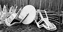 Plastic chairs in the woods