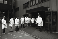 Usually found standing behind cameras...