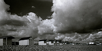 Beach Huts with approaching storm.