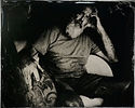 Man in chair.