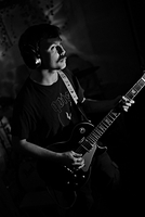 Guitarist at basement show