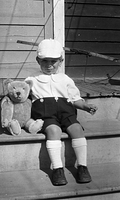 Boy and teddy, 1920's.jpg