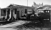 Suburban house and cars, 1920's.jpg