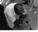 Guy kissing dog