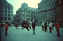 Rope jumping tourists on Dam Square Amsterdam