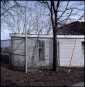 yard with fence and guy wire