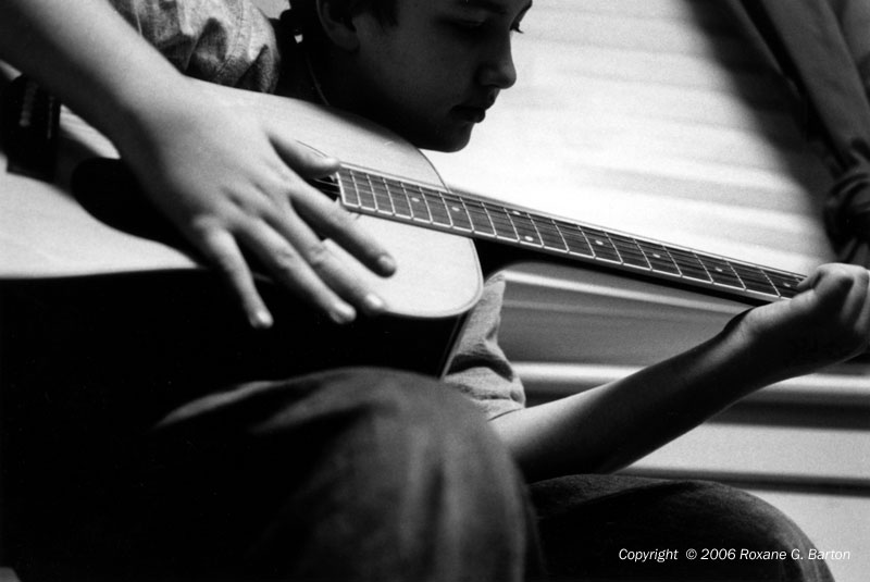 A boy with a guitar