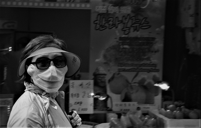 Ajumma in full flea market battle-rattle