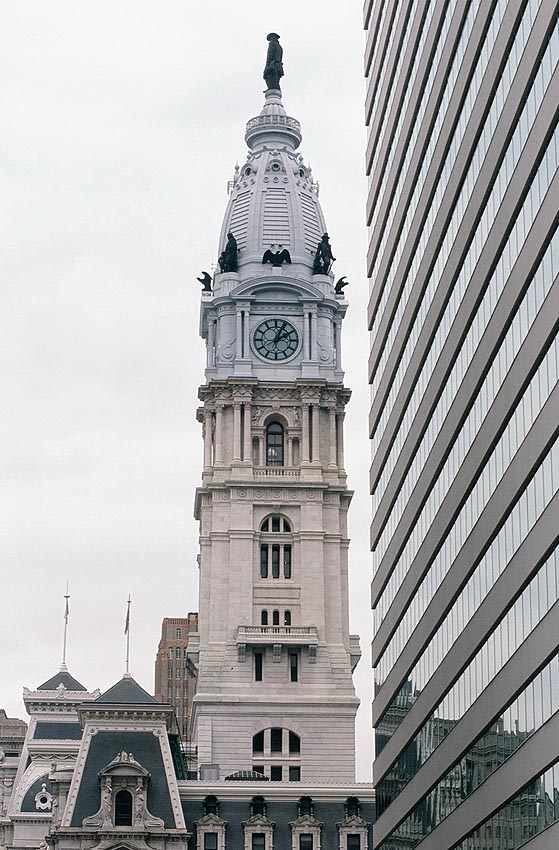 Billy Penn looks on