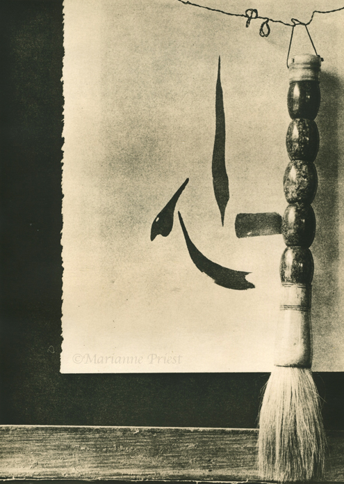 caligraphy brush and curlyQ